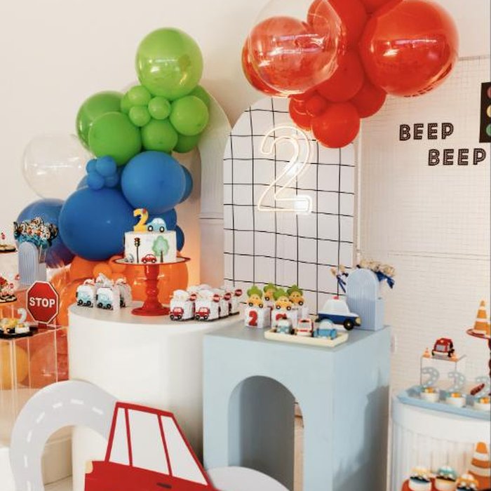 Bright primary colour balloon display at a children's party